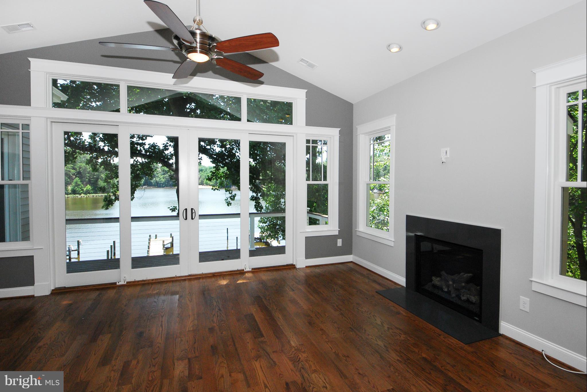 Great room has deck access & gas fireplace