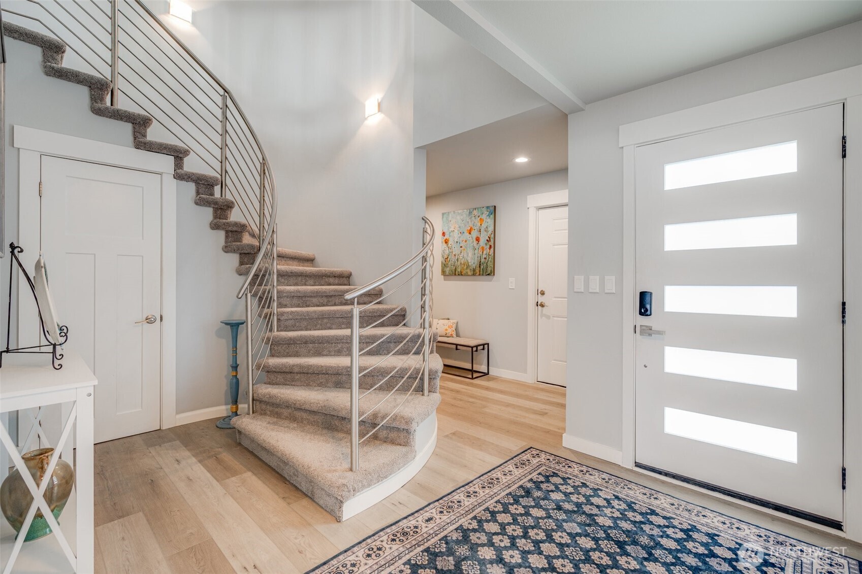 5341 South Bercot Road Freeland, WA 98249 - Photo 20 of 37 a view of entryway with stairs and wooden floor