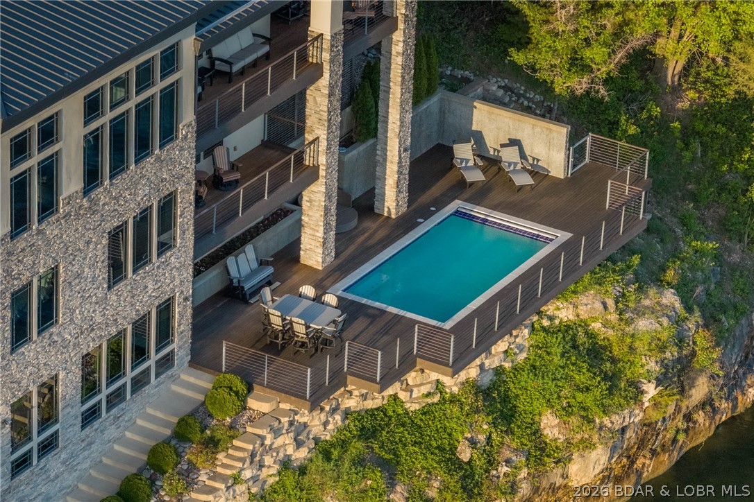 777 Malibu Road Osage Beach, MO 65065 - Photo 75 of 100 Spend your days poolside, where the calm surroundi