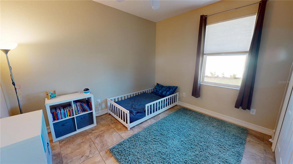 7342 North Ficus Tree Punta Gorda, FL 33955 - Photo 21 of 34 a room with furniture and a rug