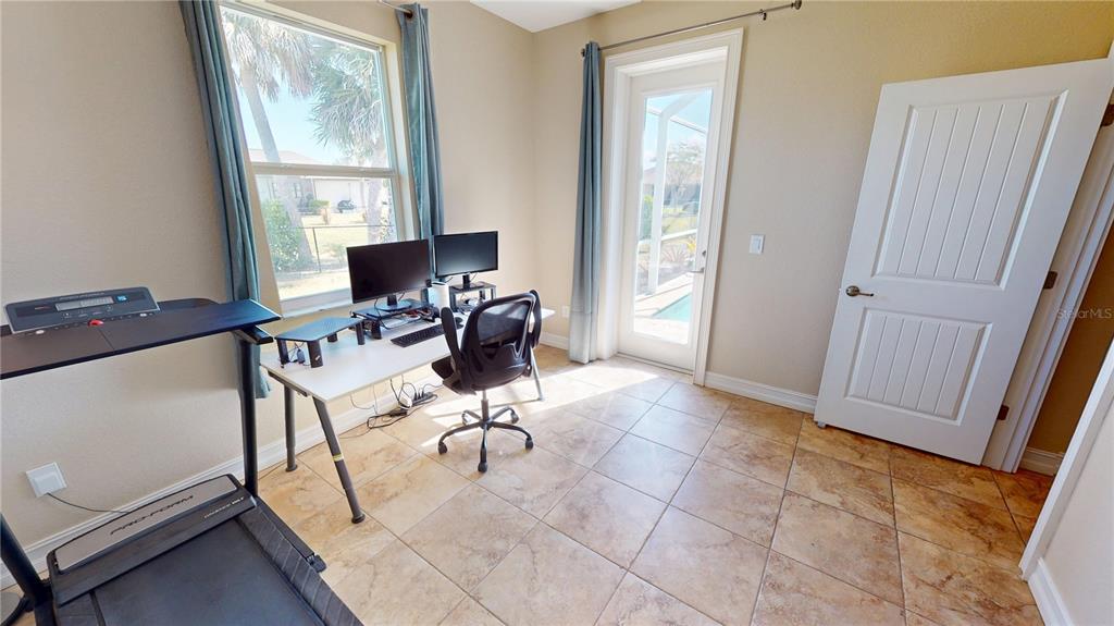 7342 North Ficus Tree Punta Gorda, FL 33955 - Photo 25 of 34 a view of a workspace with furniture and a window