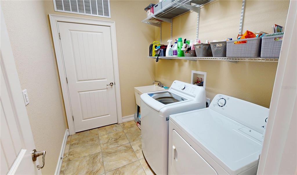 7342 North Ficus Tree Punta Gorda, FL 33955 - Photo 29 of 34 a utility room with dryer and washer