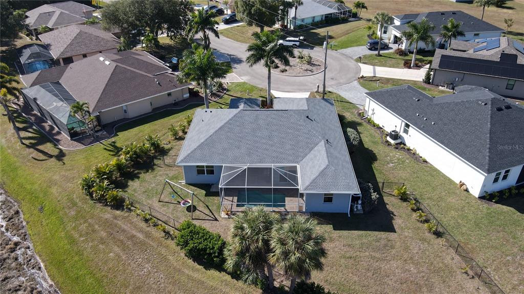 7342 North Ficus Tree Punta Gorda, FL 33955 - Photo 32 of 34 an aerial view of a house with a yard and potted plants