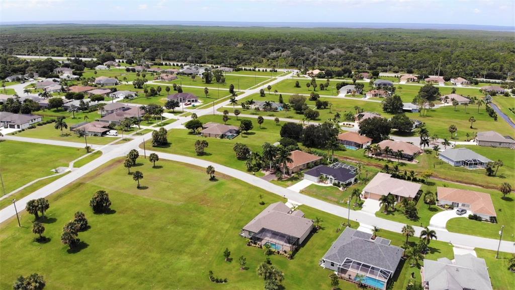 7342 North Ficus Tree Punta Gorda, FL 33955 - Photo 34 of 34 an aerial view of residential houses with outdoor space