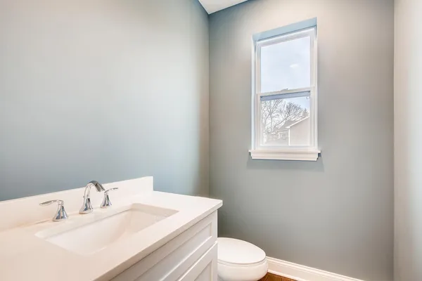 a bathroom with a sink and a toilet