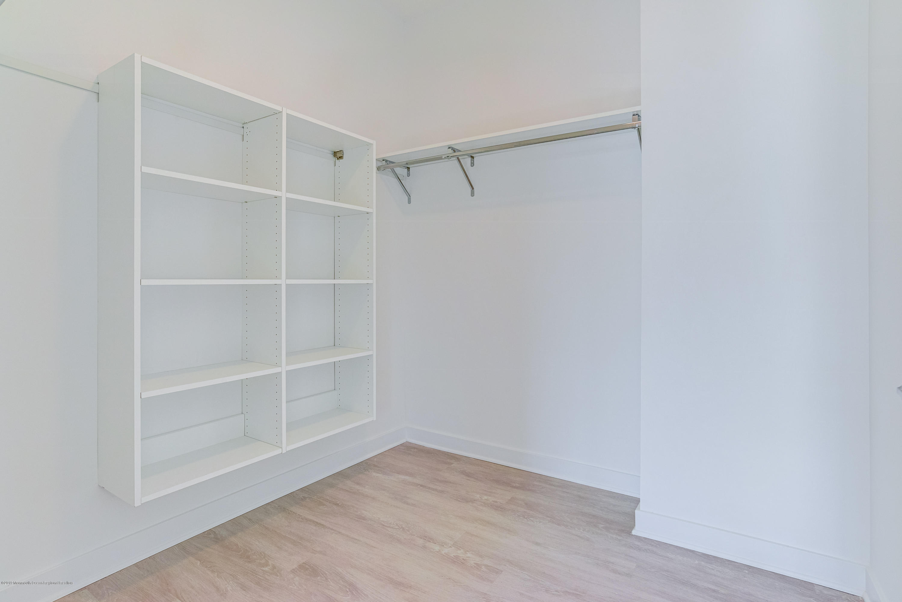 55 West Front Street, Unit 306 Red Bank, NJ 07701 - Photo 15 of 24 a view of an empty walk in closet