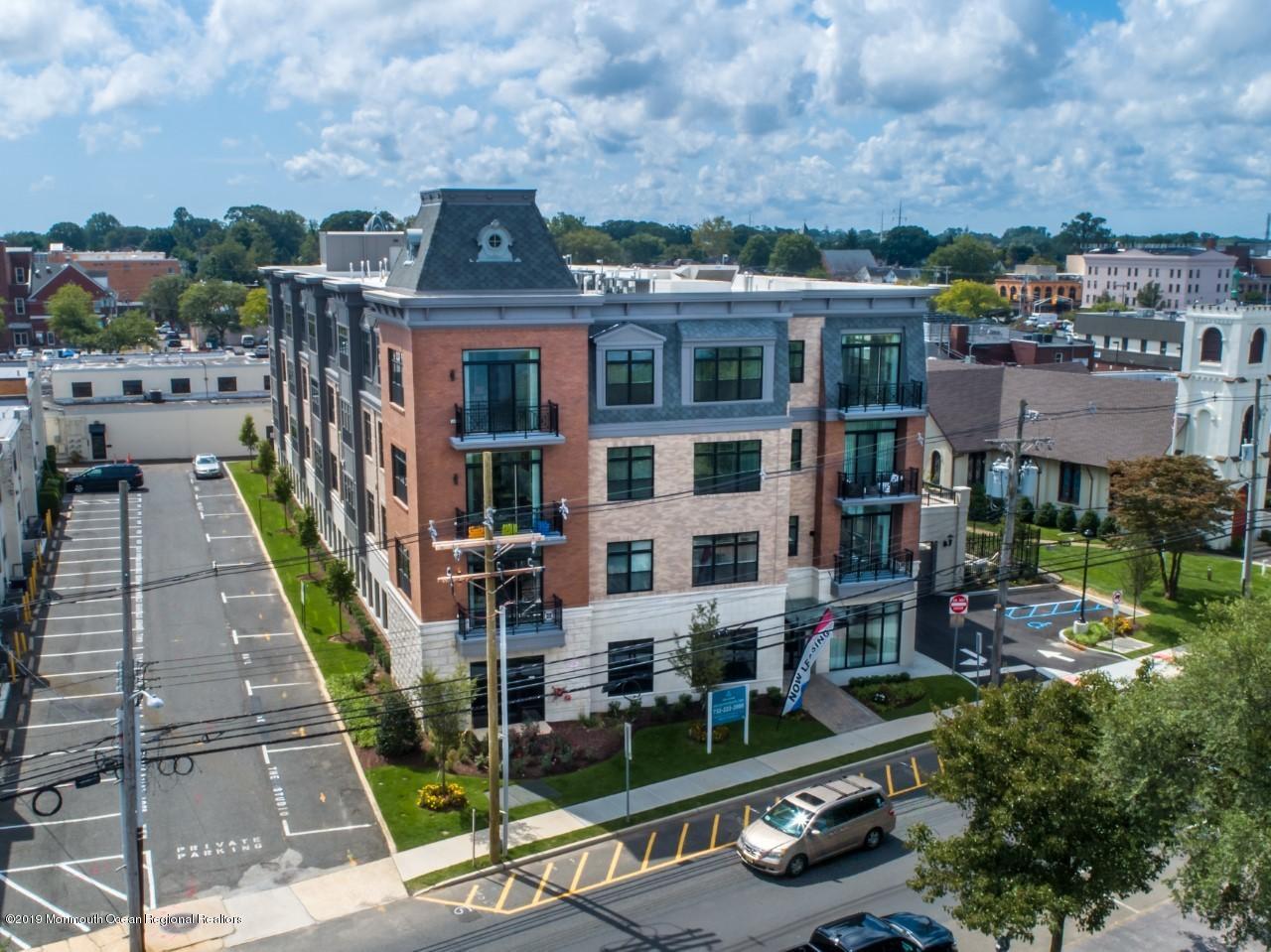 55 West Front Street, Unit 306 Red Bank, NJ 07701 - Photo 3 of 24 an aerial view of multiple houses