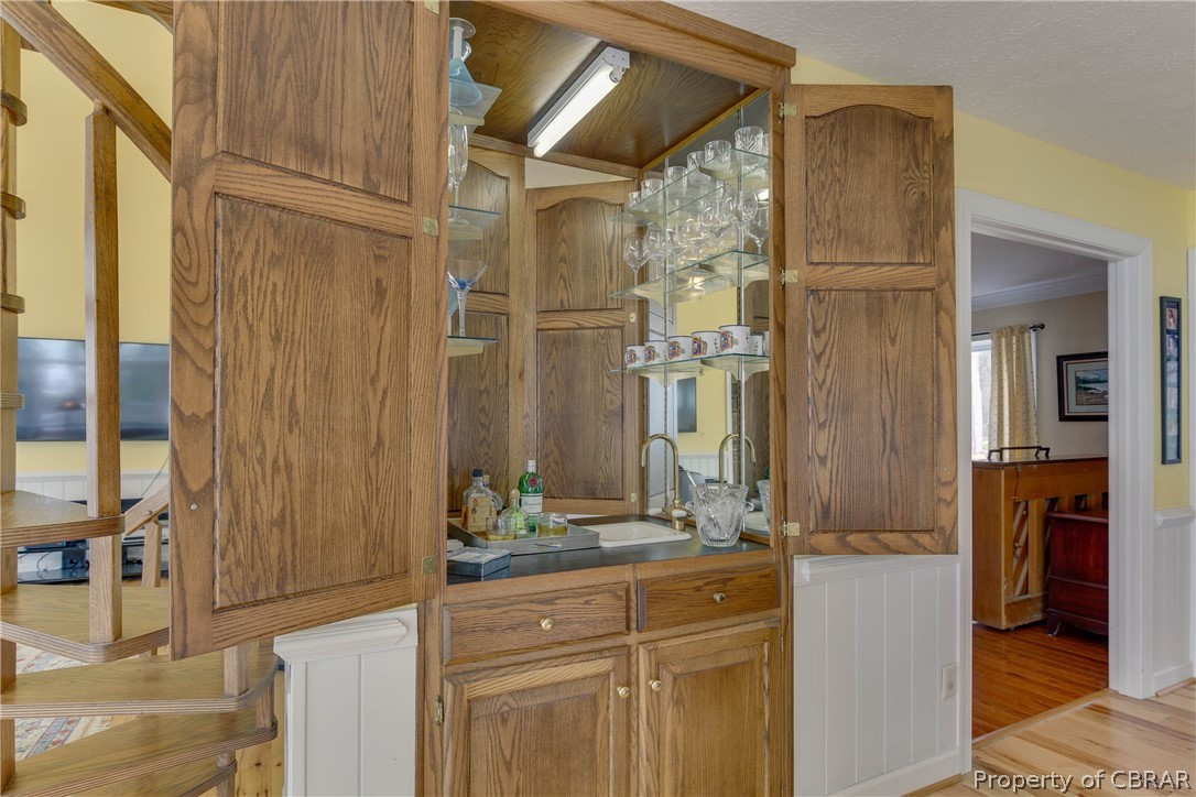 8508 Gaines Point Road Hayes, VA 23072 - Photo 11 of 50 Wet bar with pass through doors