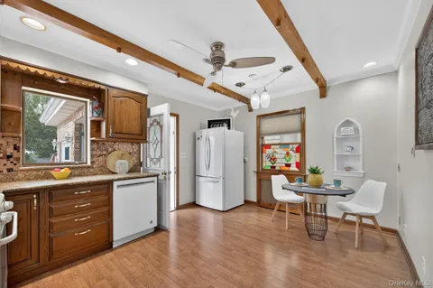 a view of a kitchen and dining room
