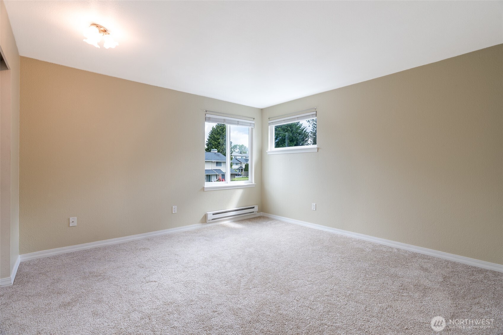 20320 Bothell Everett Highway, Unit D301 Bothell, WA 98012 - Photo 22 of 35 an empty room with windows