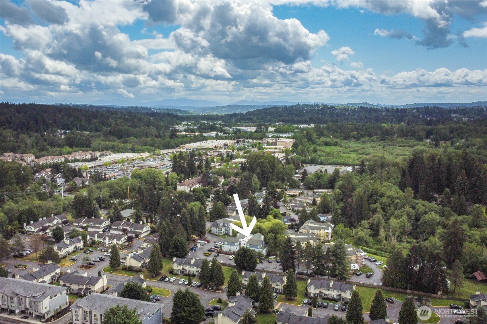 20320 Bothell Everett Highway, Unit D301 Bothell, WA 98012 - Photo 33 of 35 a view of a lot of trees and houses