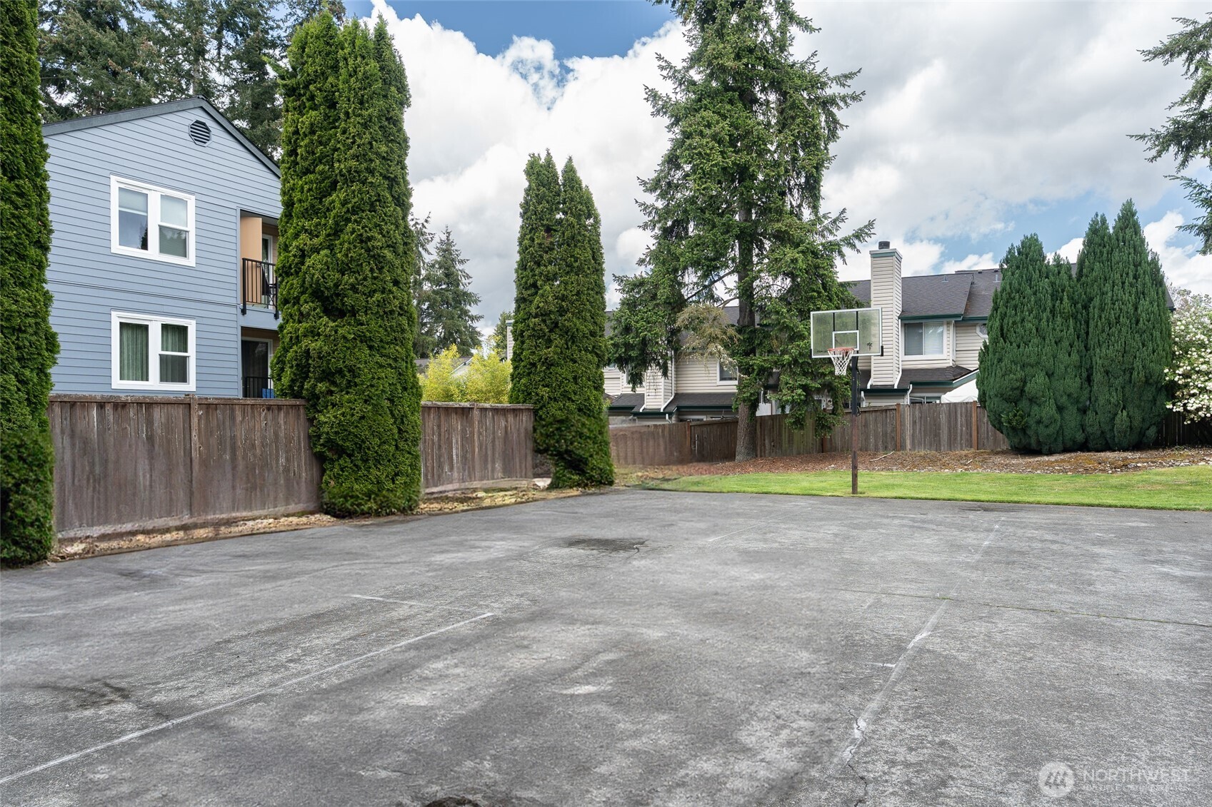 20320 Bothell Everett Highway, Unit D301 Bothell, WA 98012 - Photo 35 of 35 a view of a house with a yard