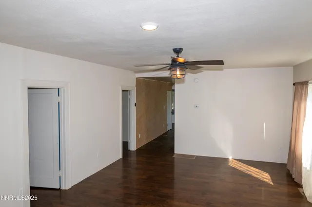 a view of hallway with wooden floor