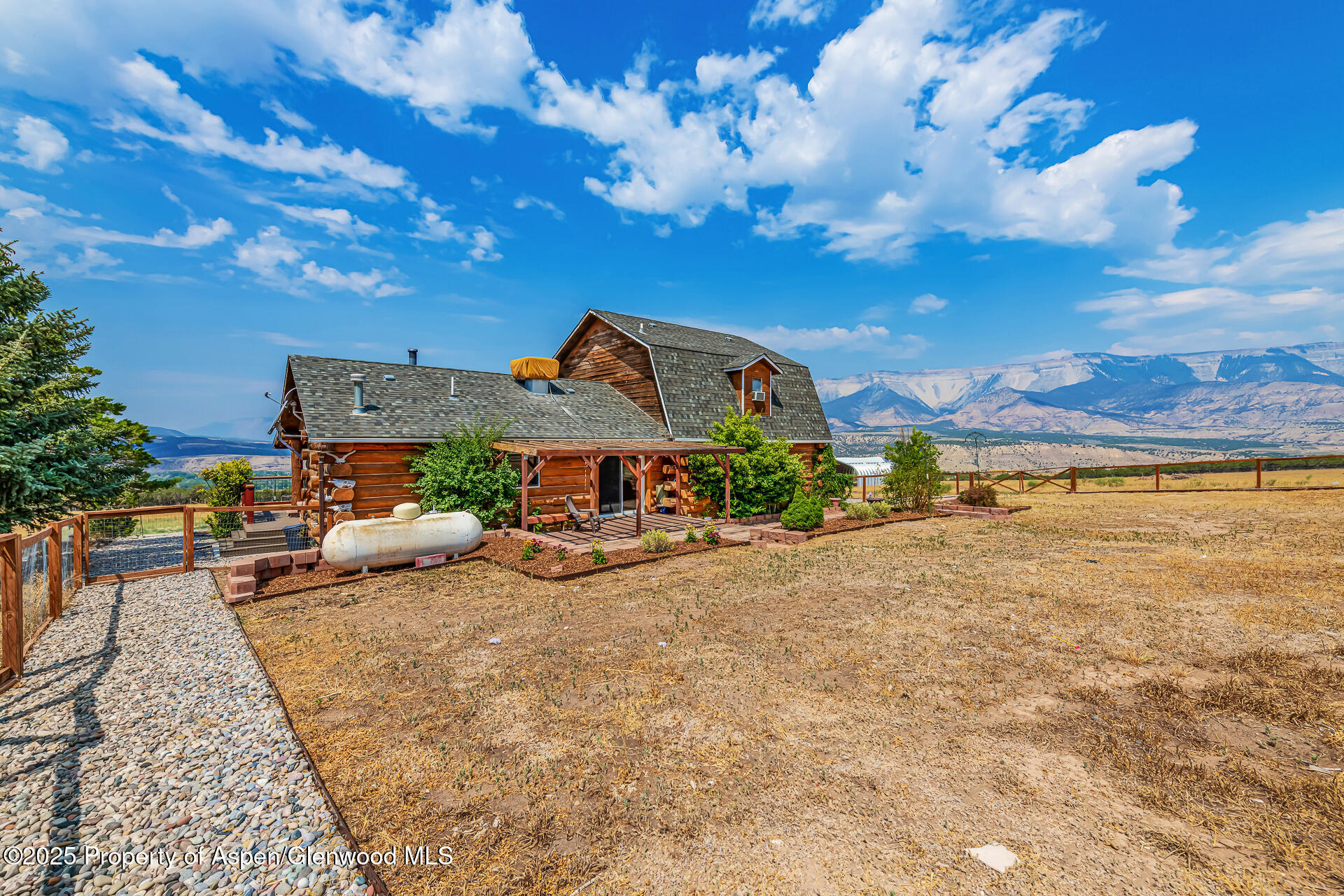 6194 County Road 320 Rifle, CO 81650 - Photo 12 of 54 a view of a house with a patio