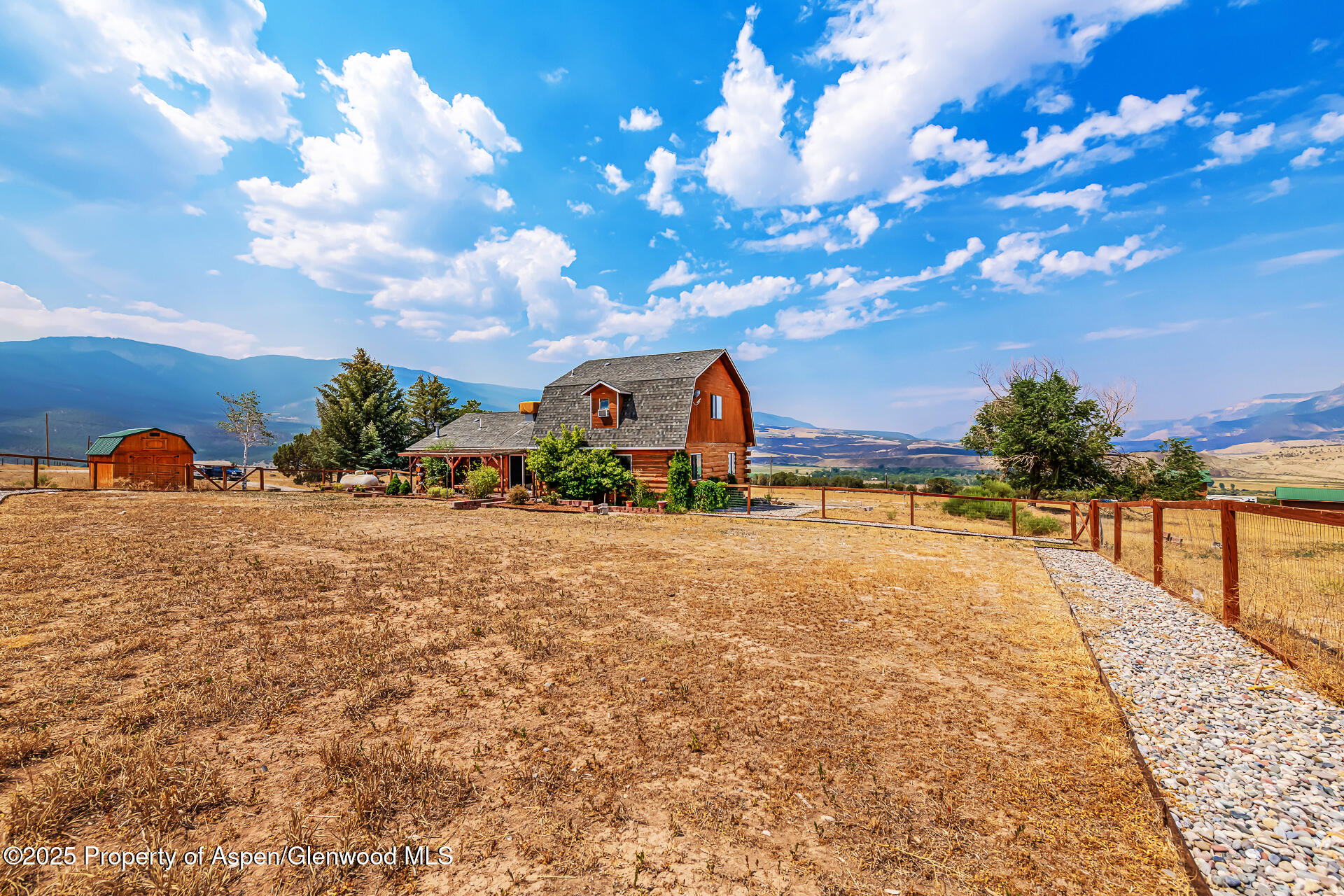 6194 County Road 320 Rifle, CO 81650 - Photo 13 of 54 a view of swimming pool with outdoor seating and plants