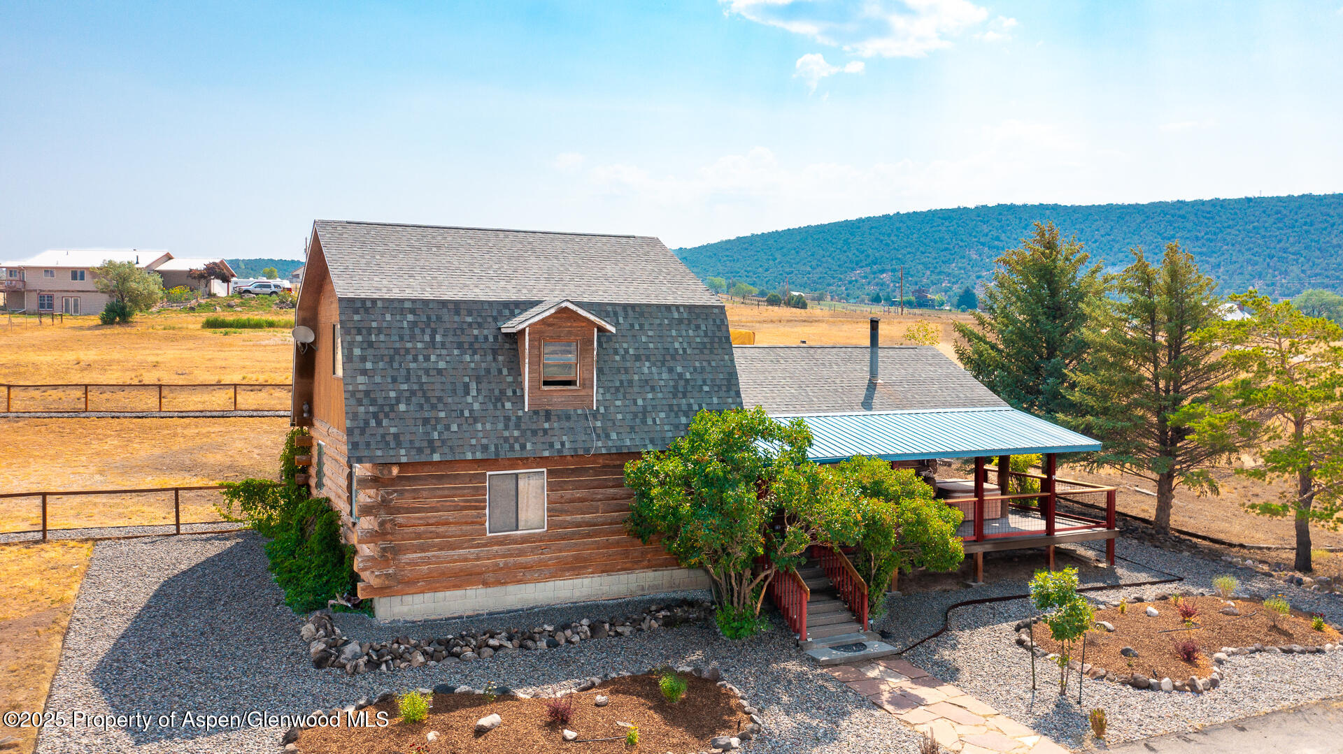 6194 County Road 320 Rifle, CO 81650 - Photo 2 of 54 a view of house with outdoor space