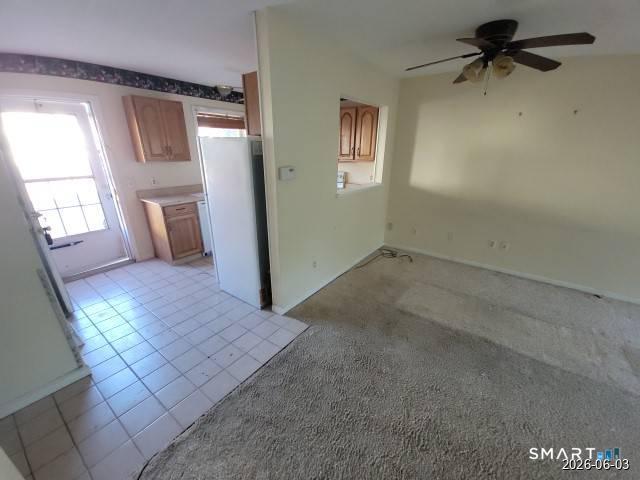28 Commodore Cmns, Unit 28 Derby, CT 06418 - Photo 8 of 17 an empty room with windows and entrance