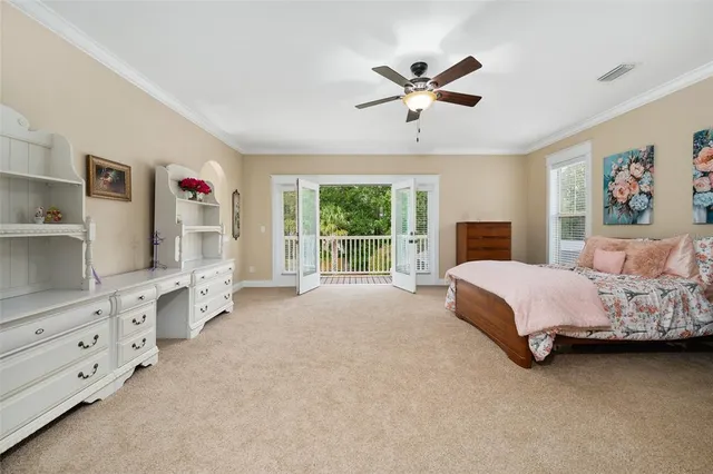 a bathroom with a granite countertop sink mirror vanity and toilet