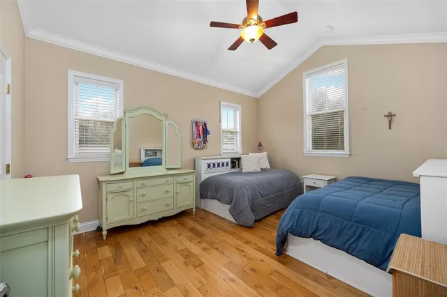 a view of a house with backyard and garden