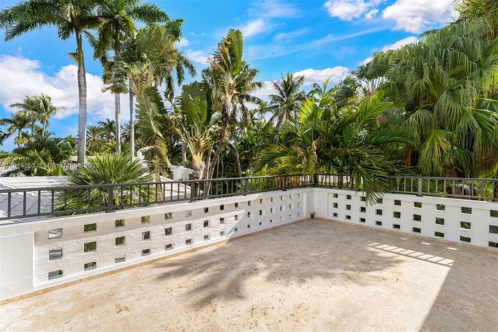 6675 Roxbury Lane Miami Beach, FL 33141 - Photo 12 of 40 a view of a wooden fence