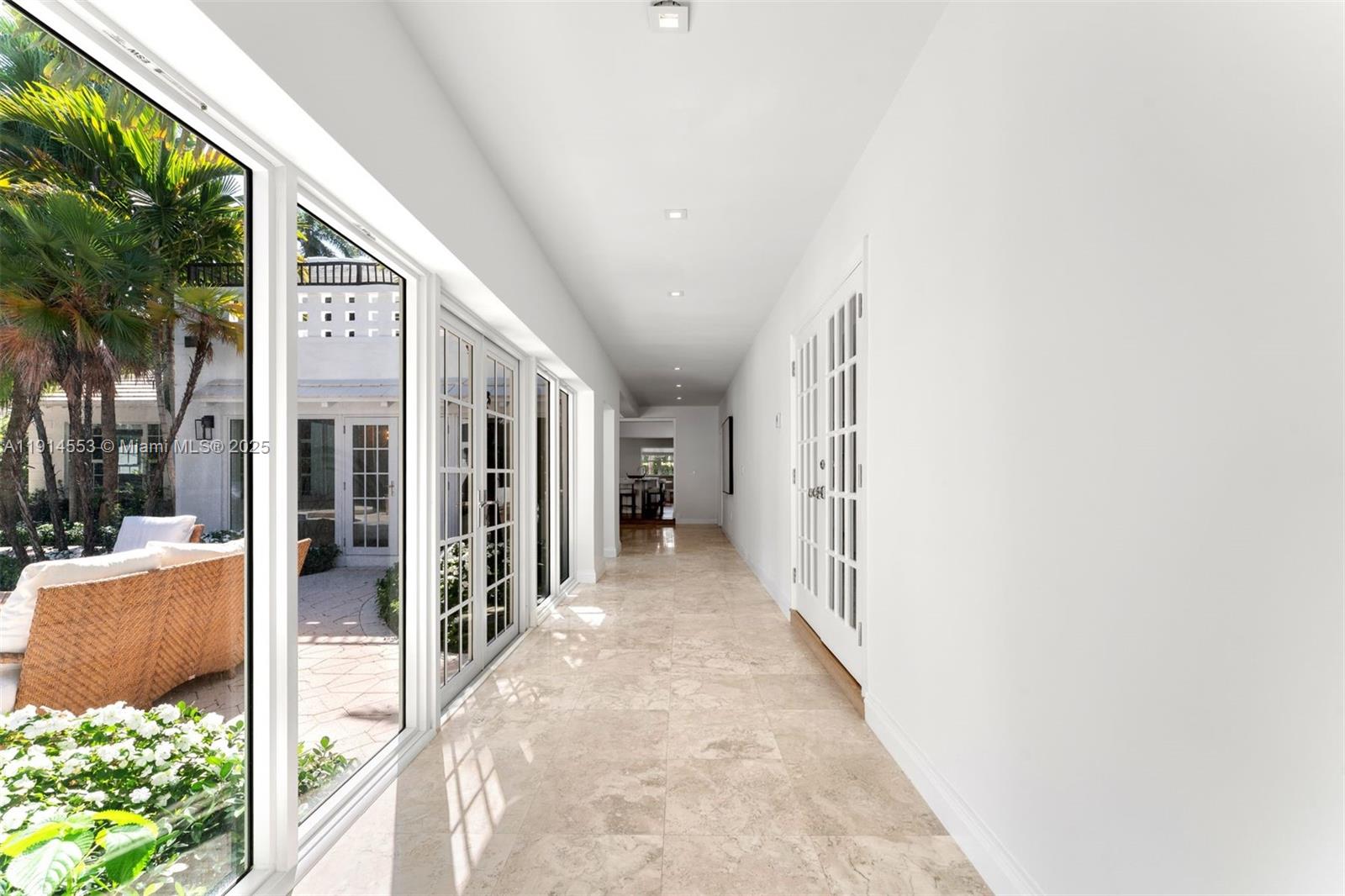 6675 Roxbury Lane Miami Beach, FL 33141 - Photo 29 of 40 a view of a porch