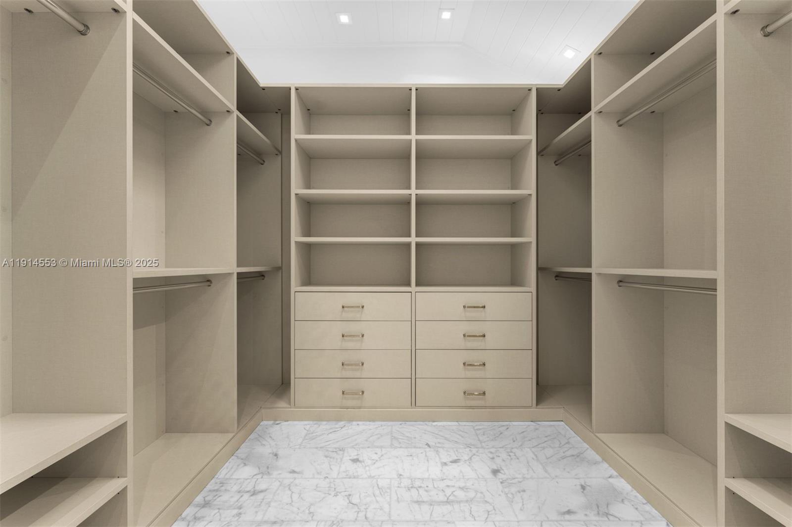 6675 Roxbury Lane Miami Beach, FL 33141 - Photo 10 of 40 a view of an empty walk in closet