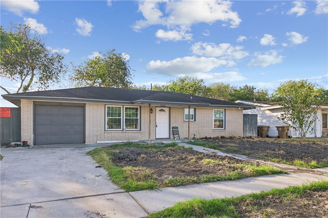 front view of house with a yard