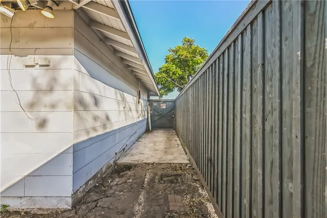 a view of balcony with wooden floor