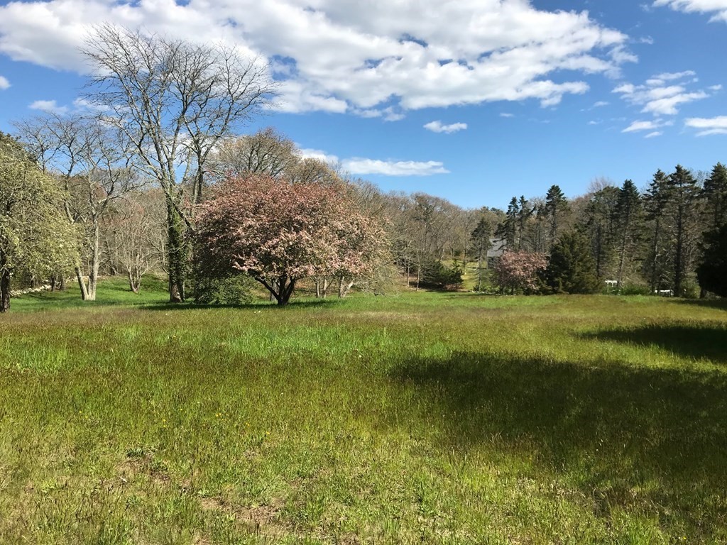 1526 Hyannis-Barnstable Road Barnstable, MA 02630 - Photo 3 of 7 a view of a golf course with a lake