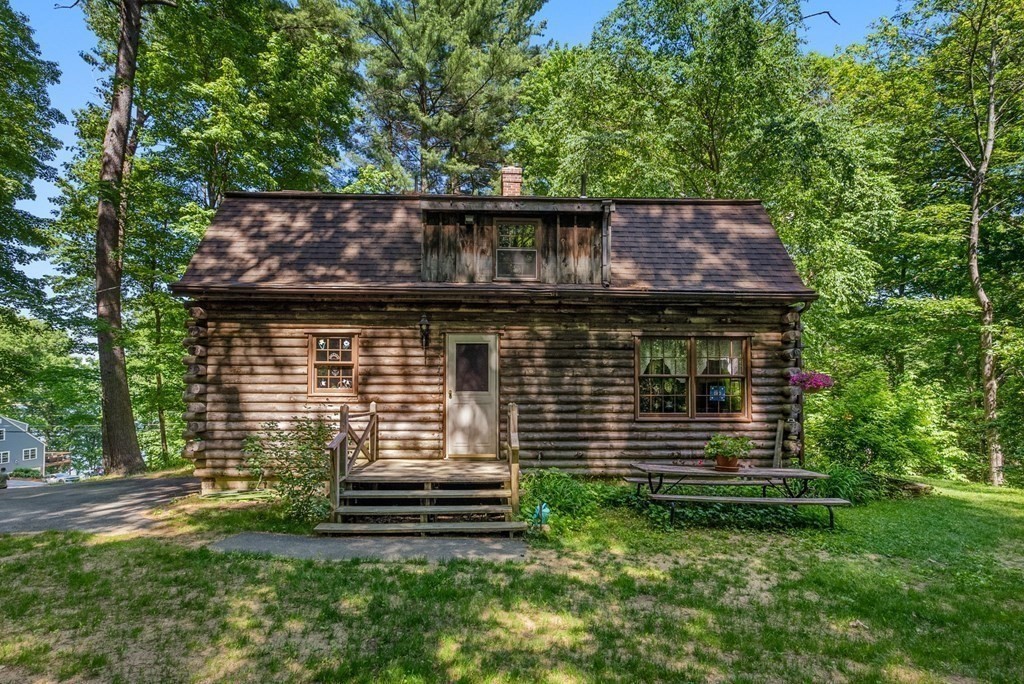 73 Allen Road Brookfield, MA 01506 - Photo 11 of 39 a front view of a house with a garden