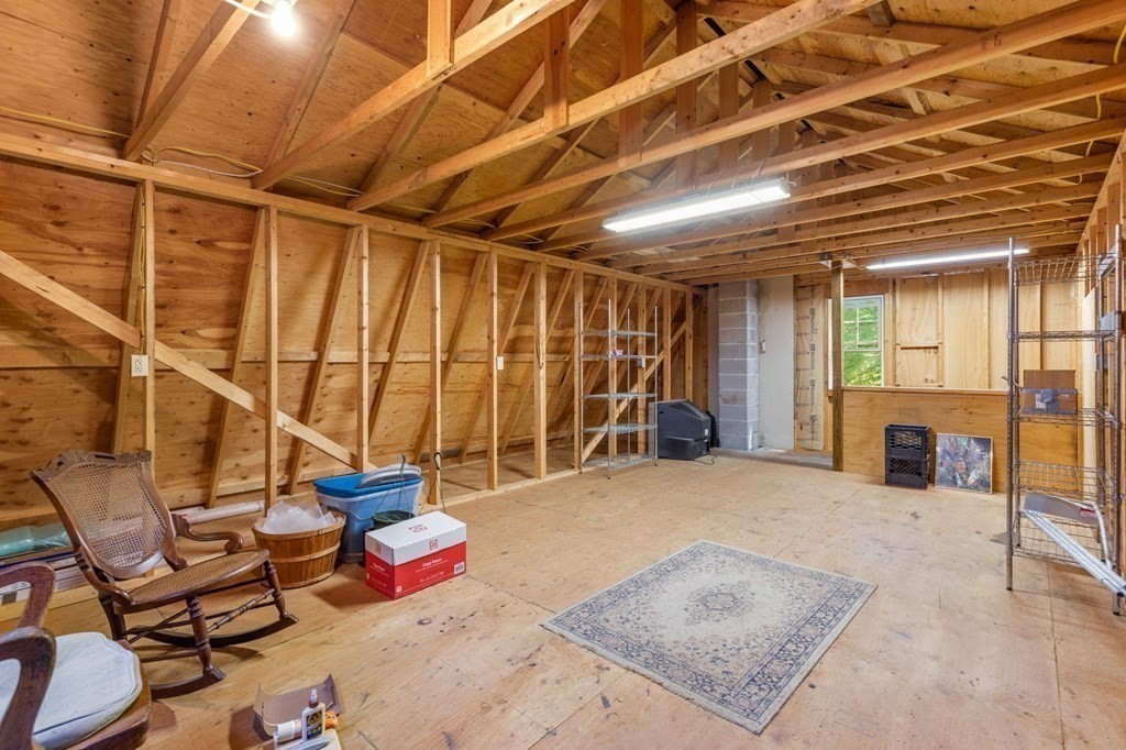 73 Allen Road Brookfield, MA 01506 - Photo 35 of 39 a bed room with a bed and a table