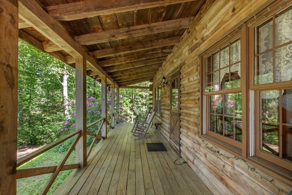 73 Allen Road Brookfield, MA 01506 - Photo 6 of 39 a view of a porch with wooden floor
