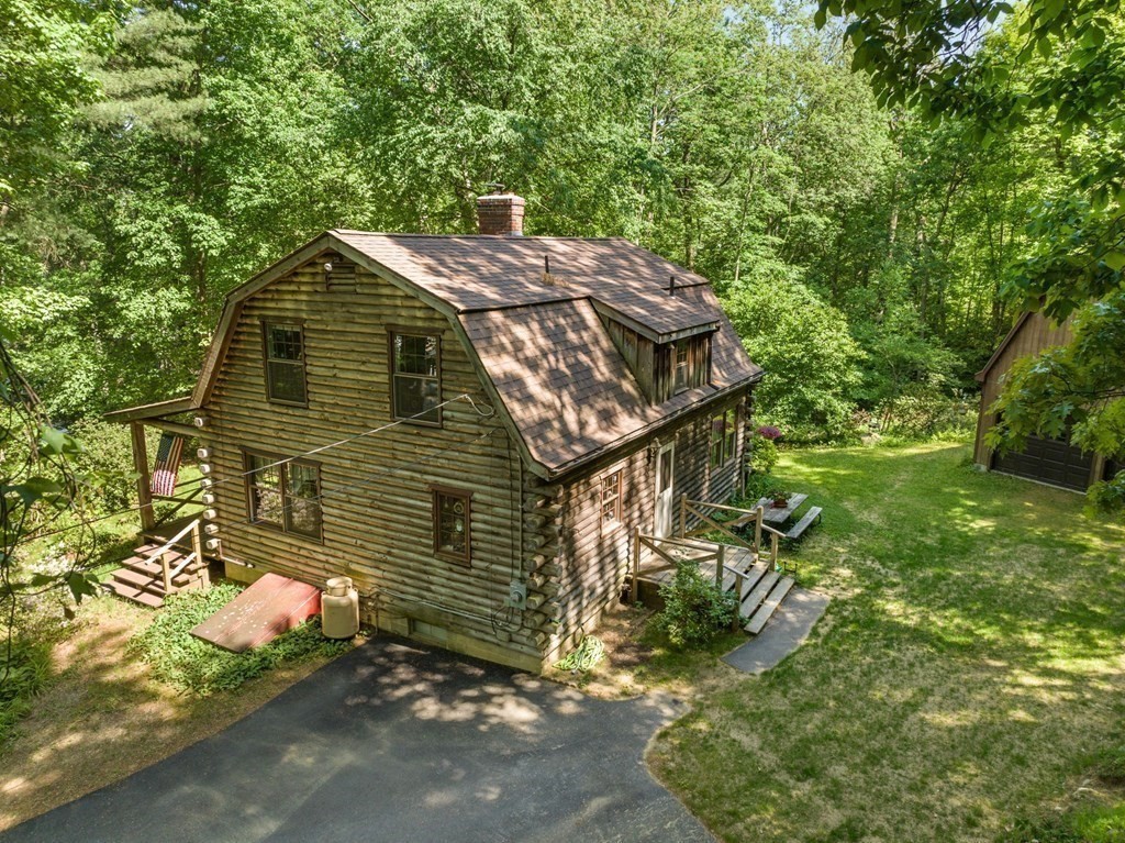 73 Allen Road Brookfield, MA 01506 - Photo 8 of 39 a view of a house with a yard