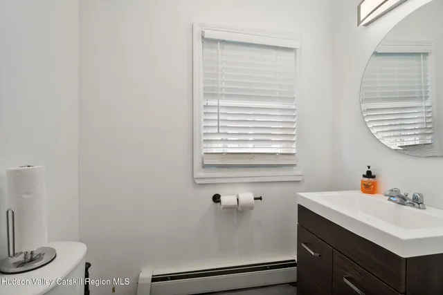 a bathroom with a sink and a toilet