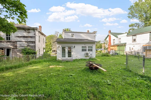a chair table and a chair in a room