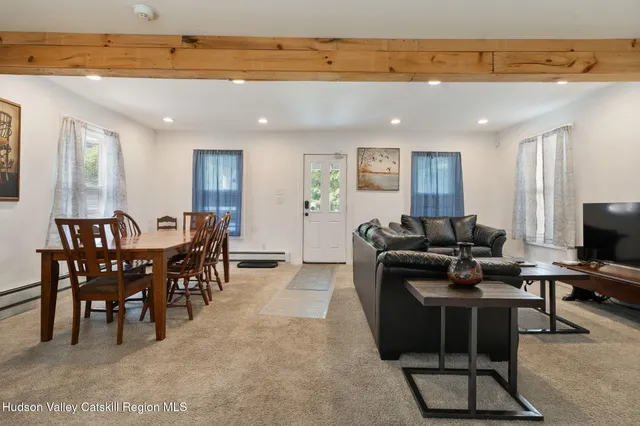 a view of a dining room with furniture