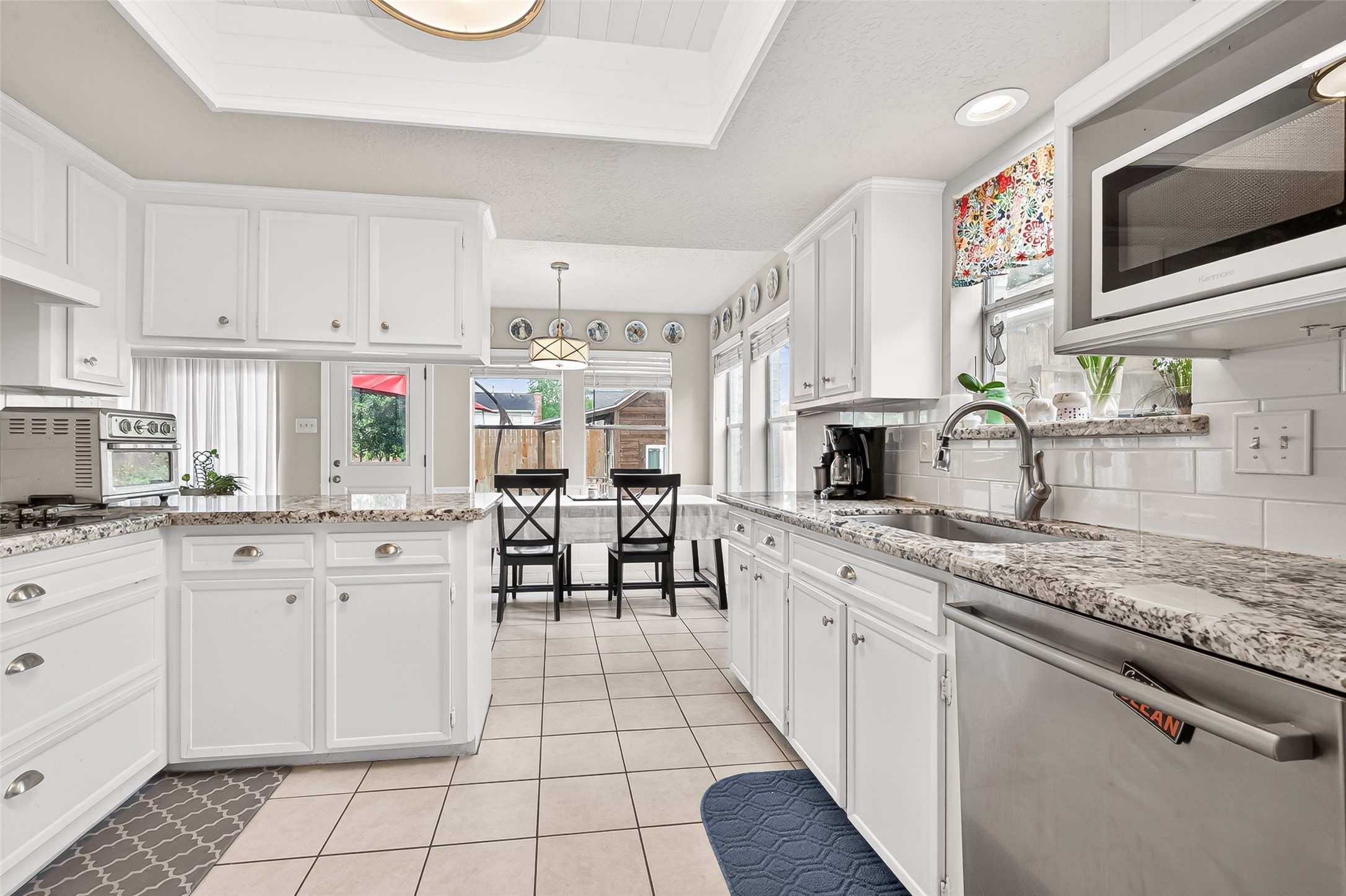 17611 Sorrell Ridge Drive Spring, TX 77388 - Photo 22 of 50 a kitchen with stainless steel appliances granite countertop a sink and cabinets