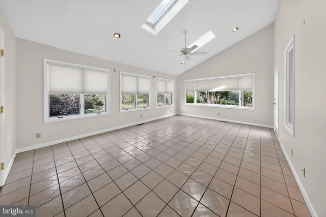 a view of an empty room and window