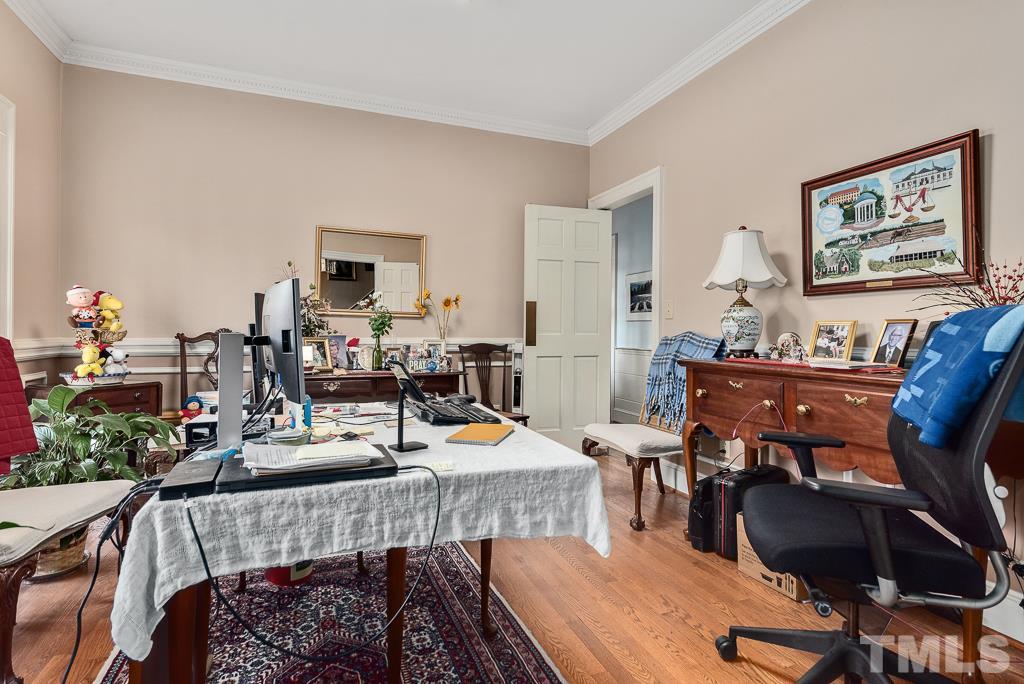 2416 Basil Drive Raleigh, NC 27612 - Photo 15 of 26 a view of a dining room with furniture