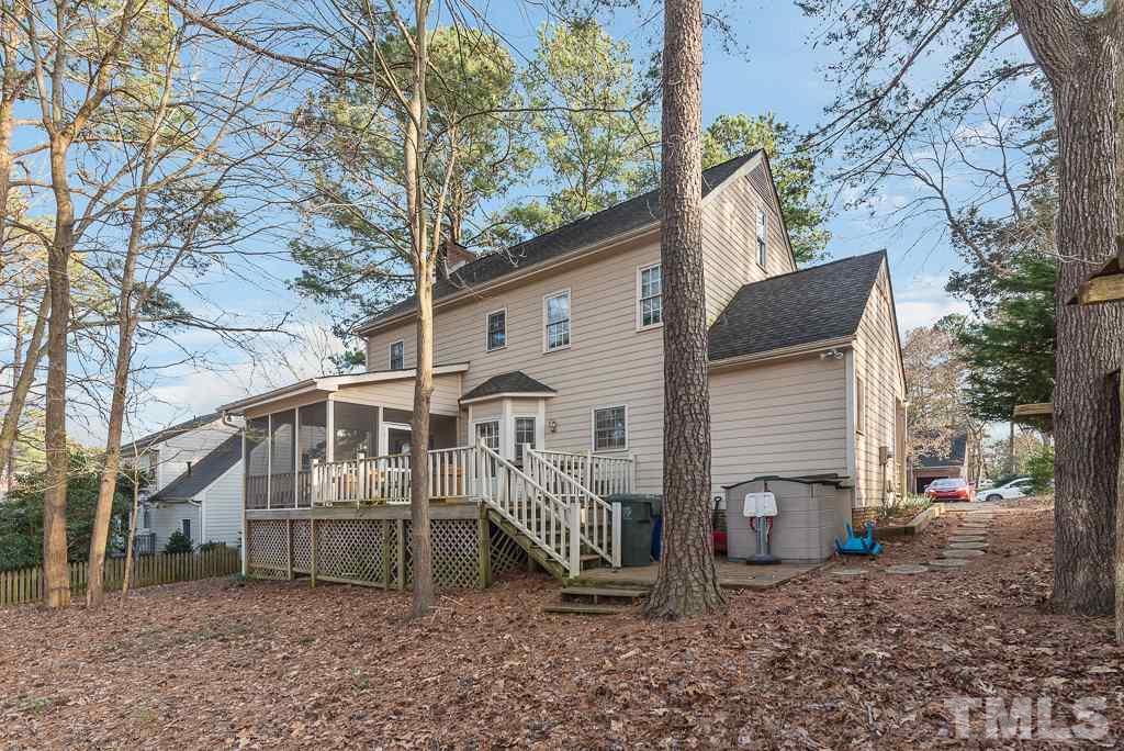 2416 Basil Drive Raleigh, NC 27612 - Photo 3 of 26 a view of a house with a yard