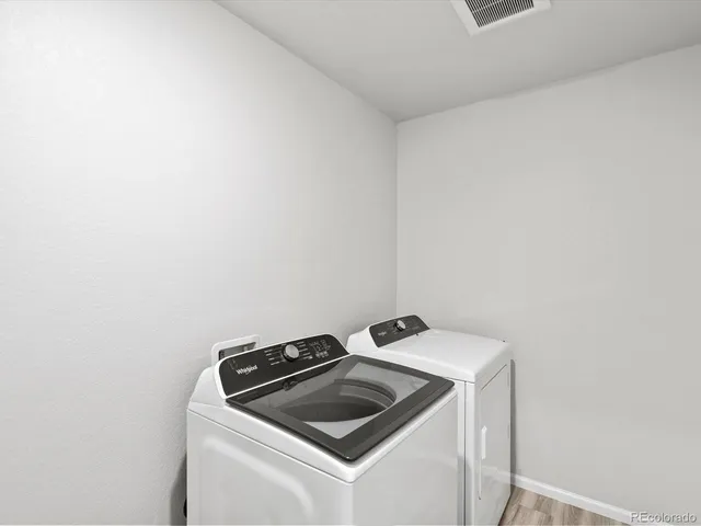 a view of utility room with washer and dryer