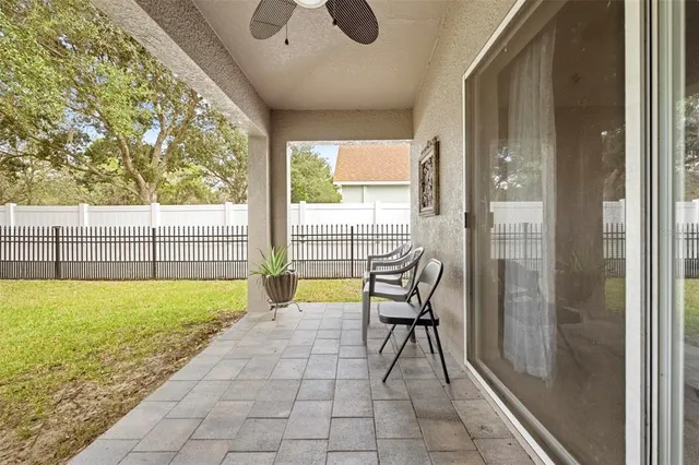 a bedroom with furniture and a chandelier