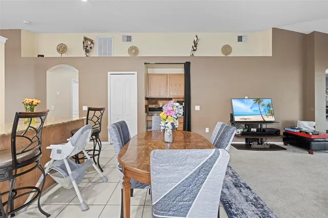 a view of a dining room with furniture