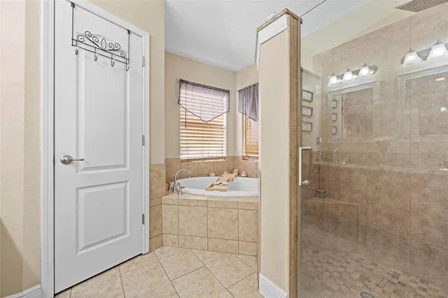 a bedroom with a bed and furniture