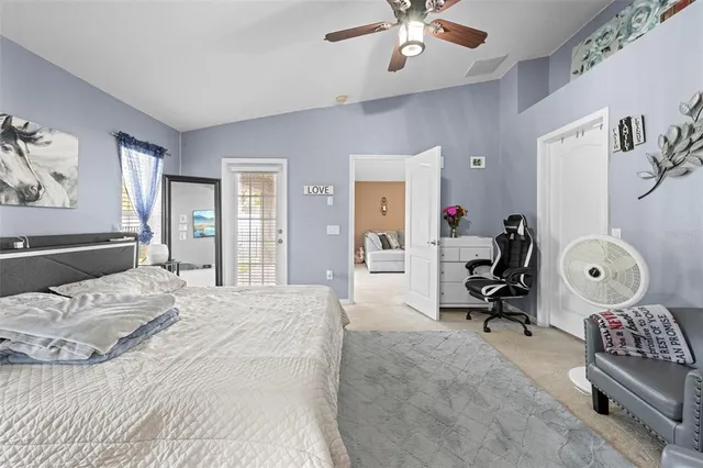 a view of a hallway with closet and front door