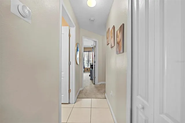 a spacious bedroom with a bed and a couch