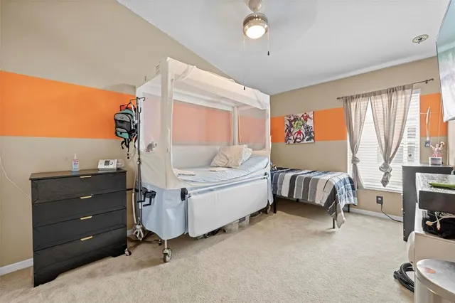 a view of a kitchen with a sink and cabinets
