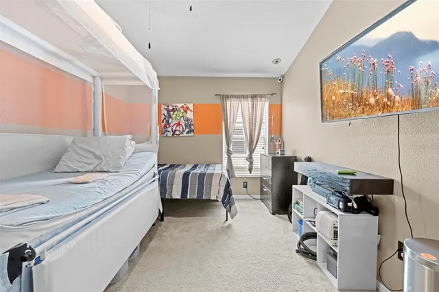 a bathroom with a shower and a toilet