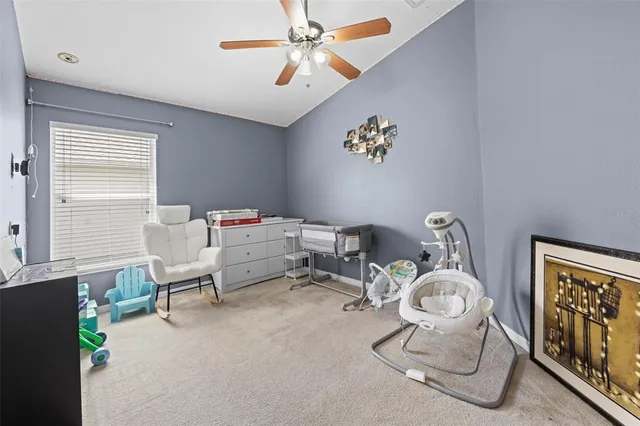 a view of a bedroom from a hallway
