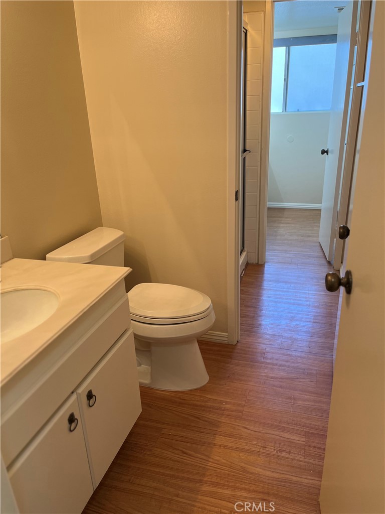 19547 Rinaldi Street, Unit 27 Porter Ranch, CA 91326 - Photo 17 of 20 a bathroom with a sink and toilet